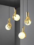 Load image into Gallery viewer, Hand Holding Globe Pendant Light