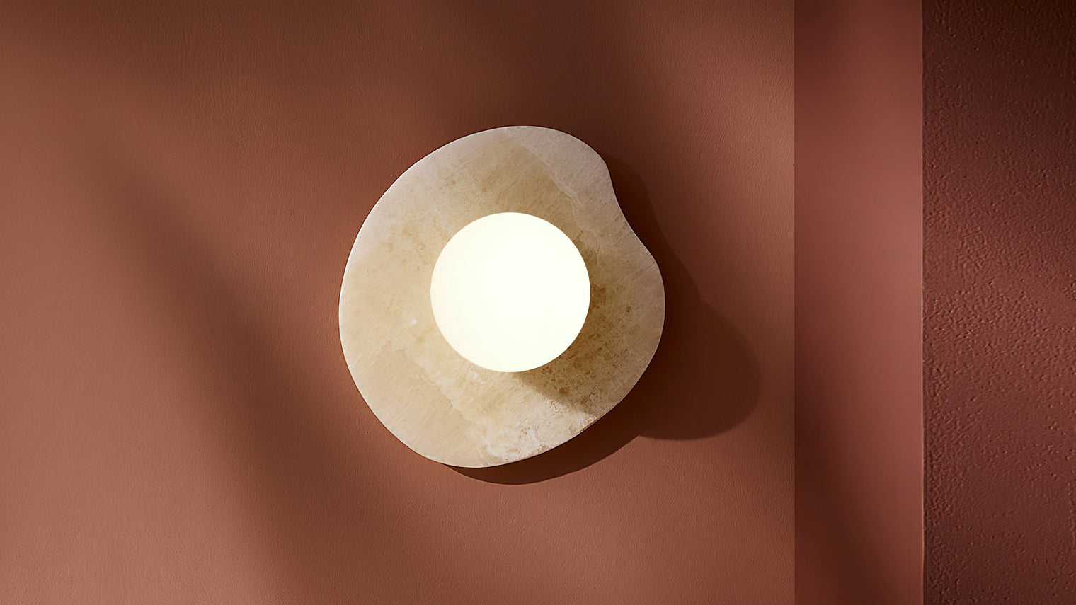 Illuminate Your Bedroom with Timeless Elegance: Stone Sconces for Every Style