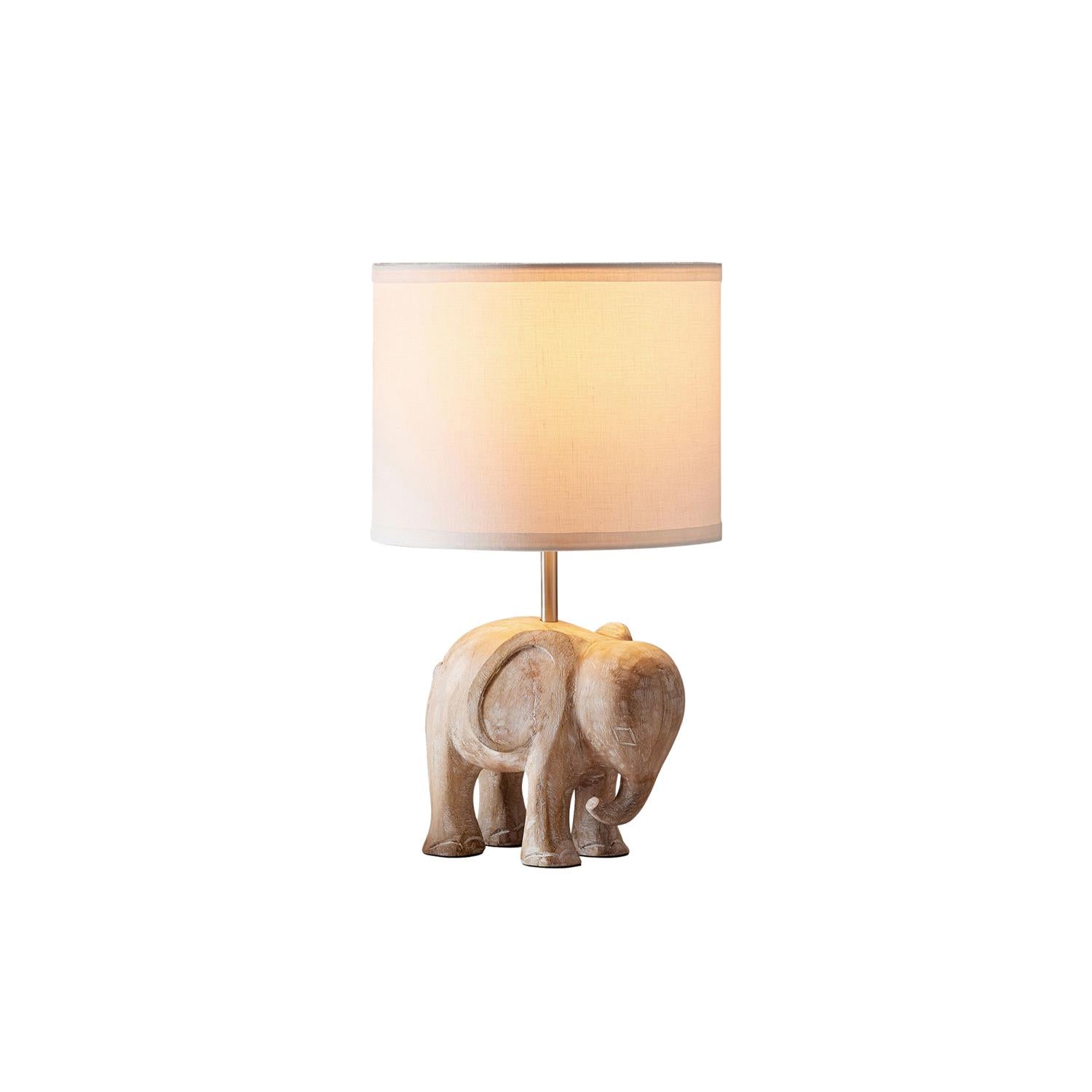 Lampe de table en bois sculpté avec animaux