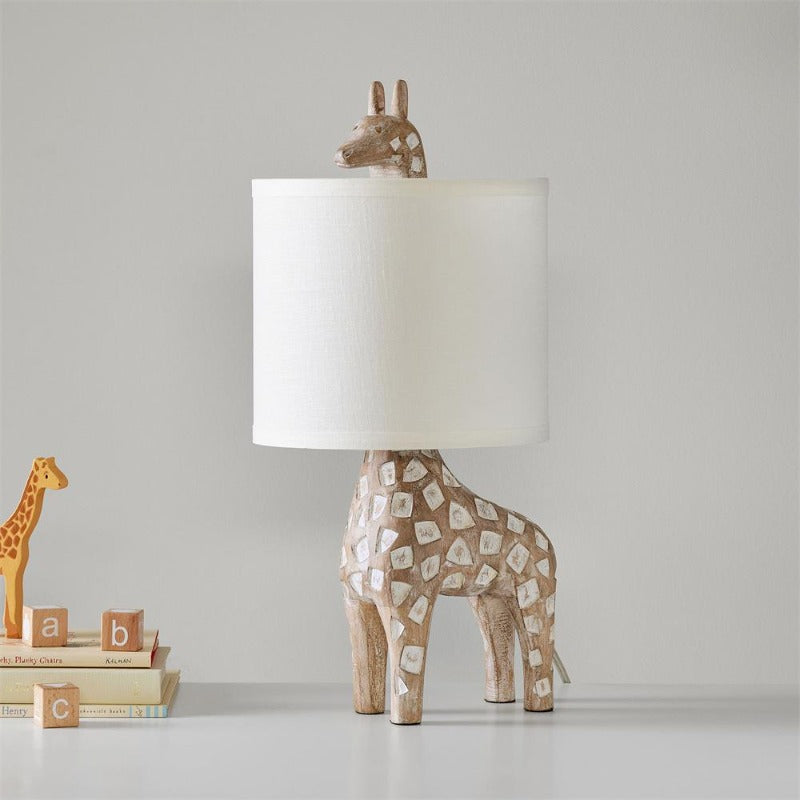 Lampe de table en bois sculpté avec animaux