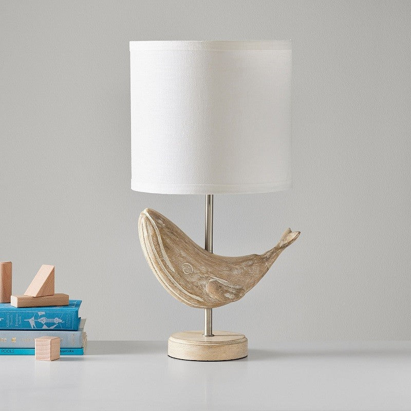 Lampe de table en bois sculpté avec animaux