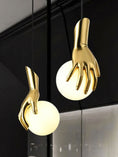 Load image into Gallery viewer, Hand Holding Globe Pendant Light
