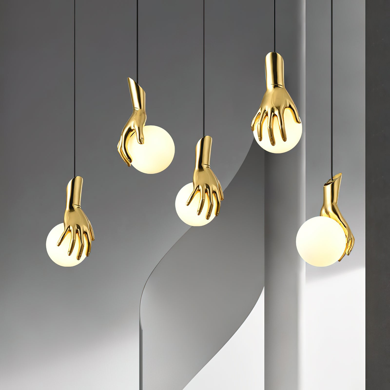 Hand Holding Globe Pendant Light