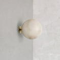 Load image into Gallery viewer, Planette Alabaster Wall Lamp
